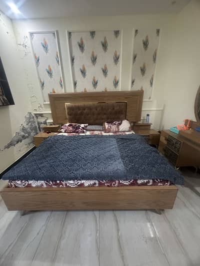 King sized bed and dressing with 2 side table