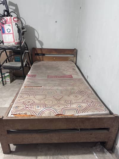 Single bed with two single mattresses