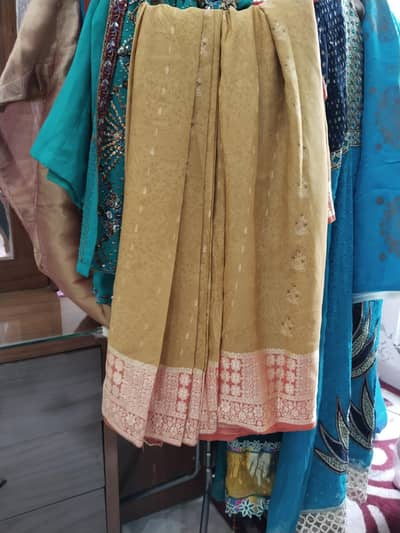 zabrdast party wear  saree  silk  or georget type