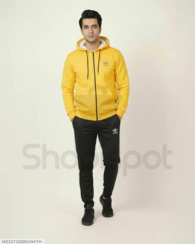 Track suit in yellow and black colour. Delivery available.