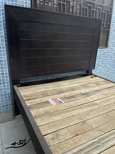 Single wooden Bed: