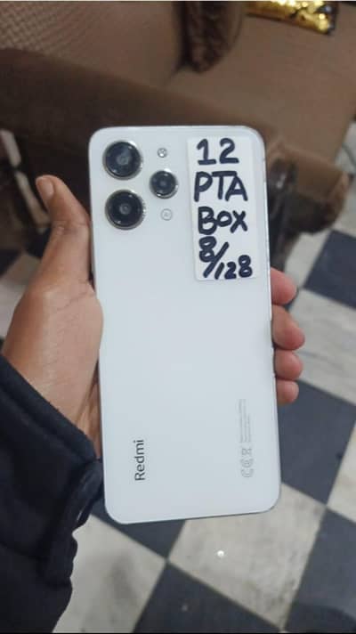 Redmi 12  8+4 GB ram 128 gb storage good condition  with box only