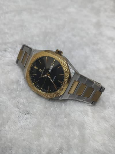 branded golden watch with date and time