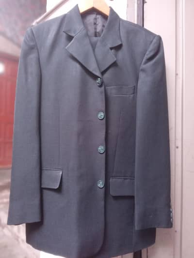 Pant cote in dark green colour.