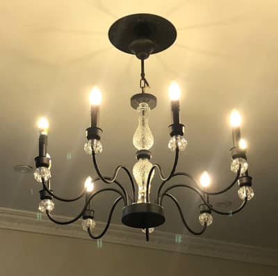 Stunning black chandelier with glass touch