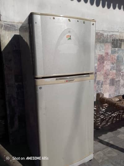 dolance refrigerator good candition 3 din check warranty