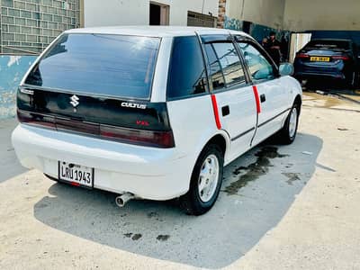 2003 model cultus white colour Lahore registration