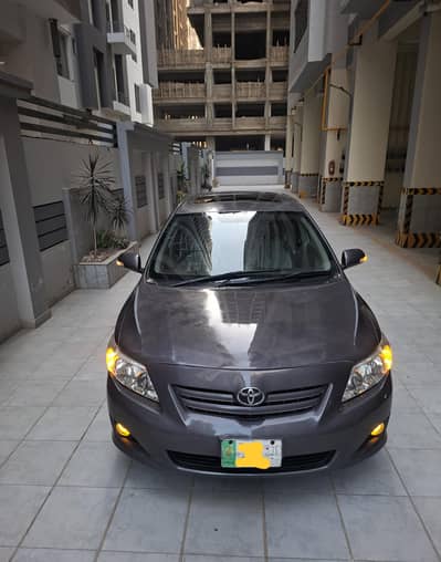 Toyota Corolla Altis 1.8 Sunroof full option.