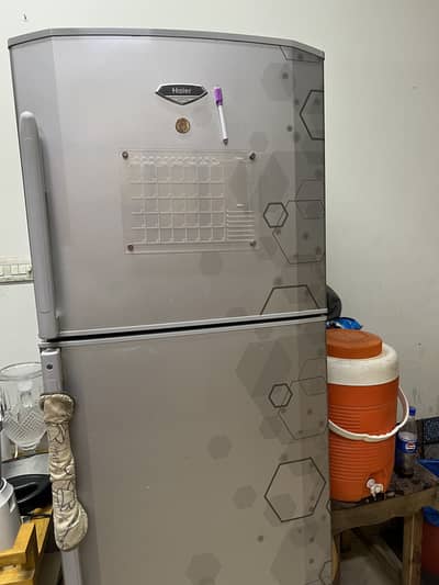 Haier refrigerator available, fully functional and well-maintained.