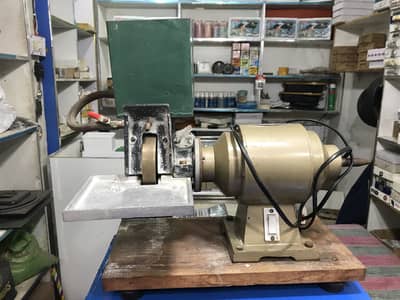 Lens granding machine