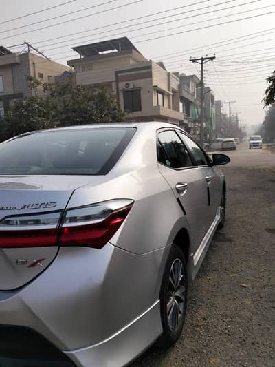 Corolla Altis 1.6 Grande silver colour total genuine