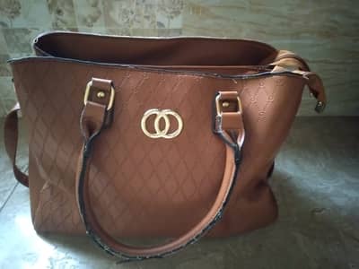 handbag with 4 zips  . . .