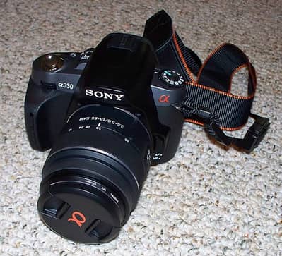 Sony A330 with 18-55 and 75-300 lens in excellent condition