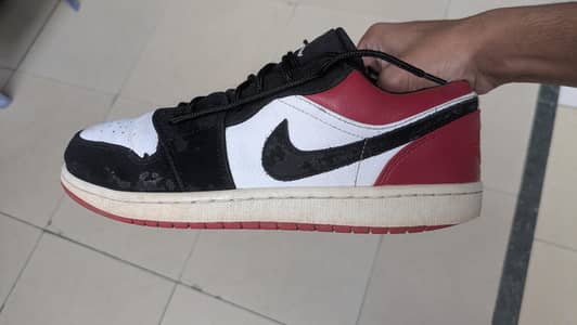 JORDAN 1 Low red toe
