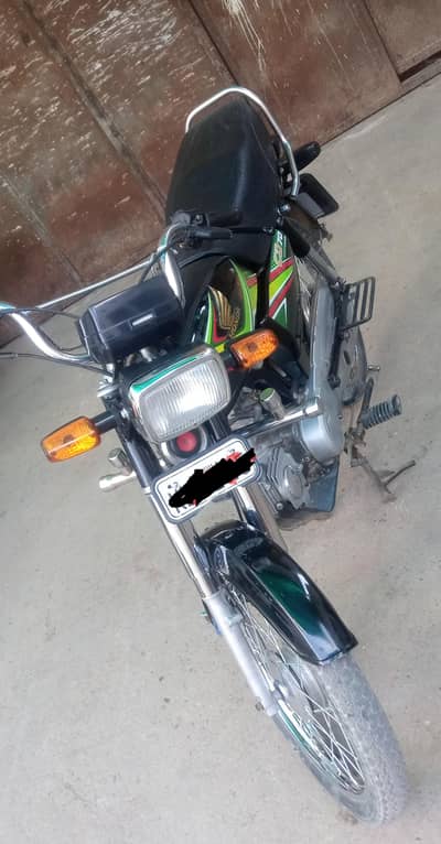 Honda 70cc . 03432627480