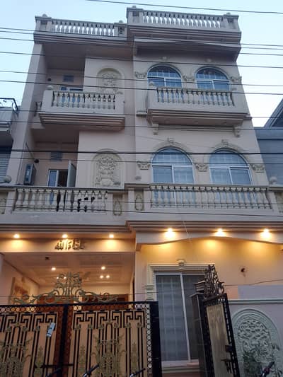 5 Marla brand new triple storey building available for rent in Johar Town near MacDonald
