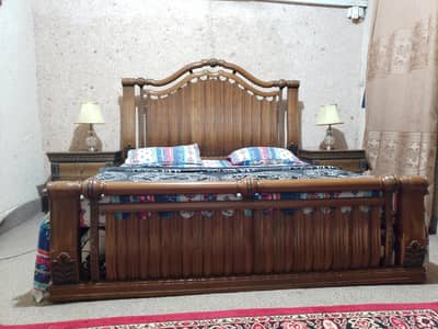 king size bed with side tables and dressing table