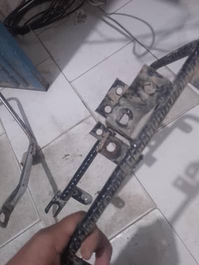 125 side stand & other 2 items