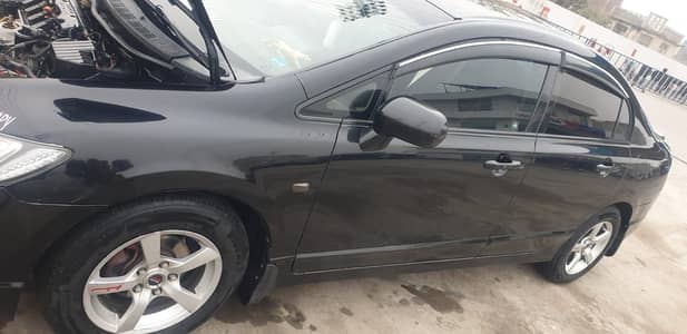 Honda civic 2011 model black color sides shower