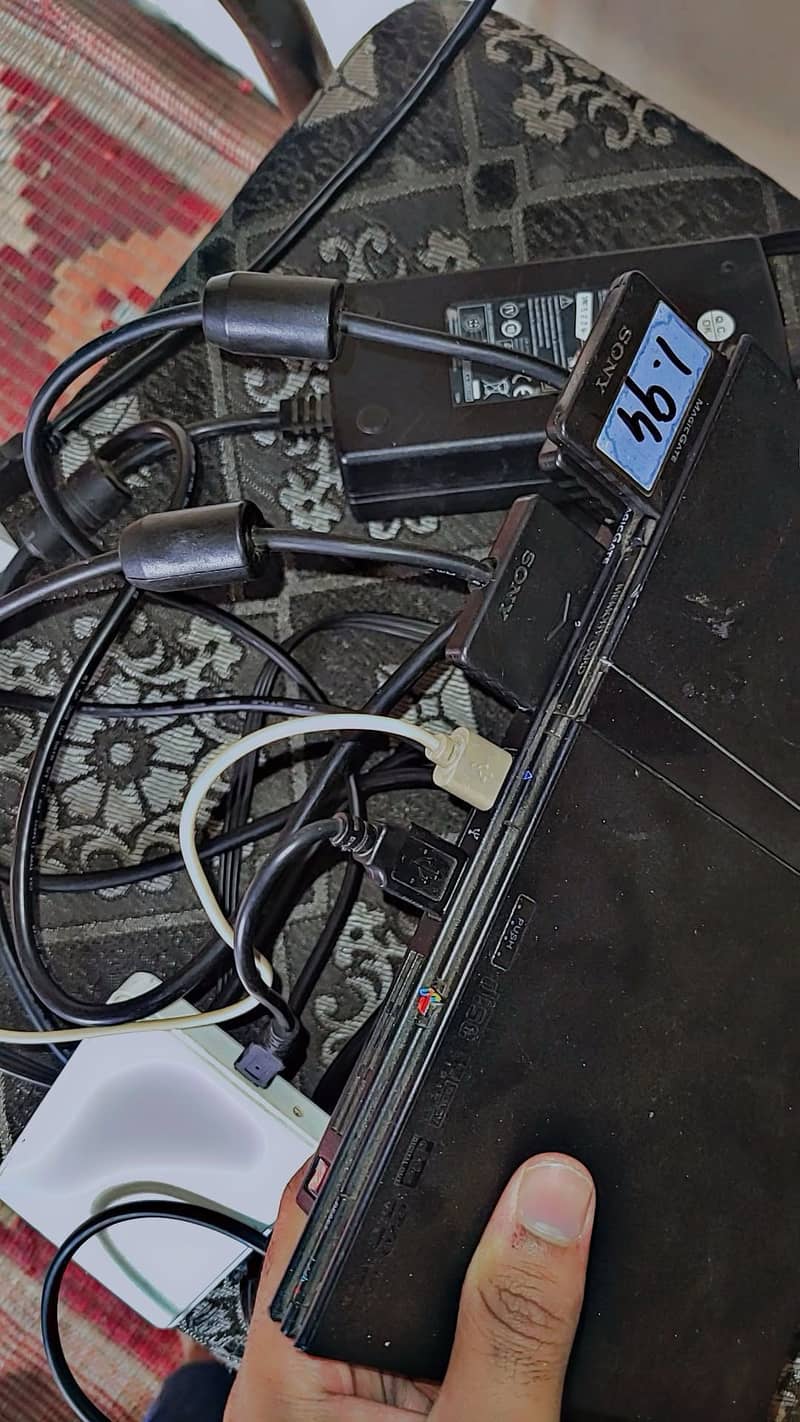 PS2 with 2 controlars 6