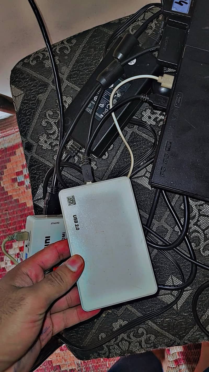 PS2 with 2 controlars 9