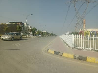 F-18 Faisal Town Rawalpindi Residential Plot surrounded by houses