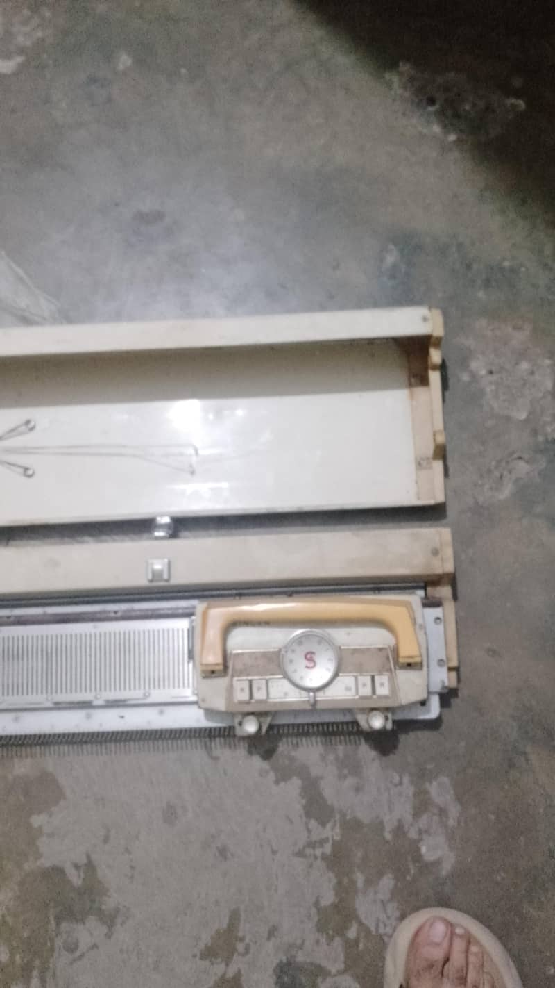 singer knitting machine 0