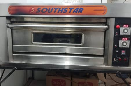Southstar Oven with stand, Dough machine, Tables and Pizza Accessories