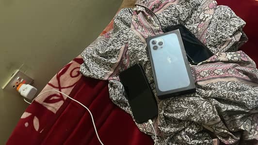 IPhone 13 Pro Max with box and charger