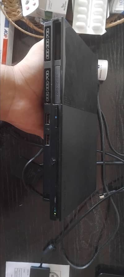 ps2 with 2 controllers and box