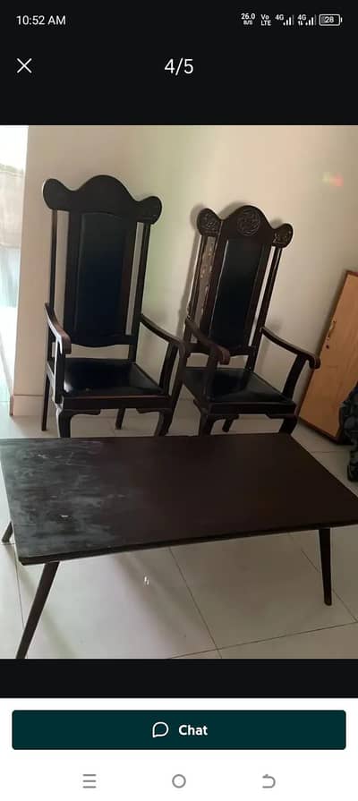 2 chairs with table