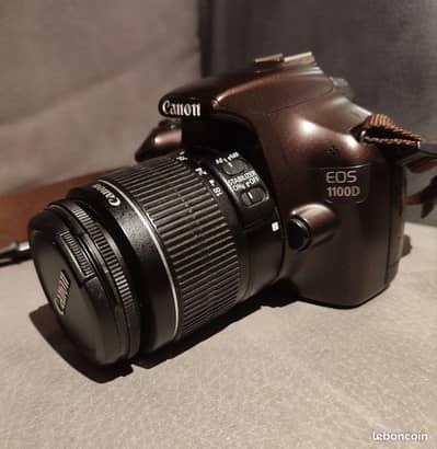 Canon 1100D dslr camera with 18-55mm lene video supports 03025271768