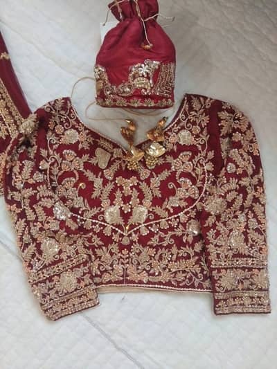 One time used 3Pc bridal dress including Lehnga,Blouse,Dupatta,Potli