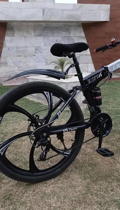 Foldable imported bicycle with gears ,dual disk brake and dual shocks