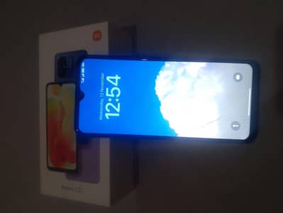 radmi 12c 4 64 box sath hy chargar ni hy 03148620327