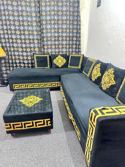 L shaped sofa with table