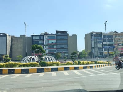 Exclusive 1 Kanal Main Road Plot | Close to Golf Course & DHA Raya | High-Growth Investment!