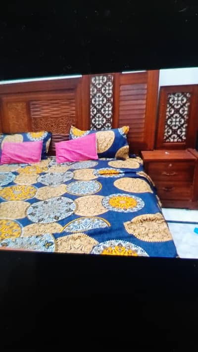 wooden bed in 64000