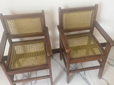 2 wooden chairs for 4000 1 full size sofa comfortbed for 3000 one Tv