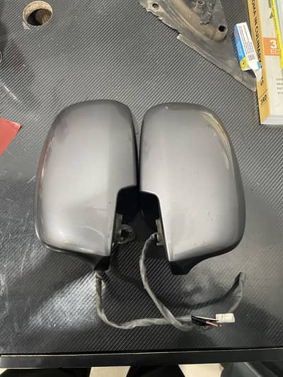 Swift side mirror retractable