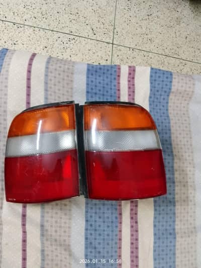 nissan march tail lights 1996-1998.