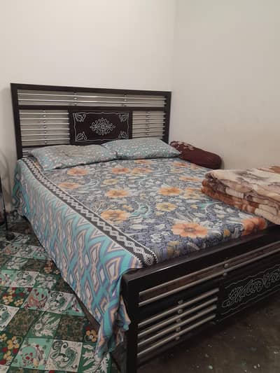 steel iron double bed.