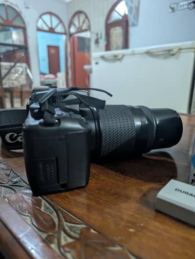 canon 1000d hai with lance  100/300