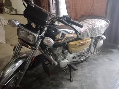 ارجنٹ فار سیل ہنڈا سی جی 125 ماڈل 2024 سلف سٹارٹ گولڈن