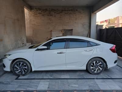 Honda Civic oriel UG white colour