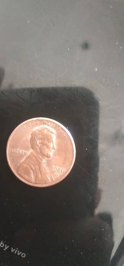 one cent coin 1986 and five cent coin 2014