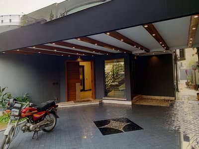 20 MARLA ELEGANT BUNGALOW IS AVAILABLE ON RENT IN THE BEST BLOCK OF PHASE 4 DHA LAHORE.