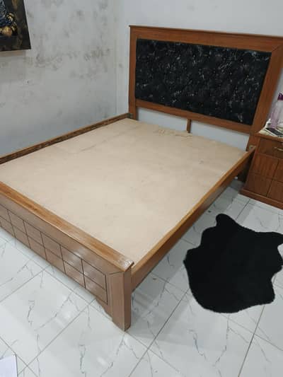 Double queen size bed with side tables