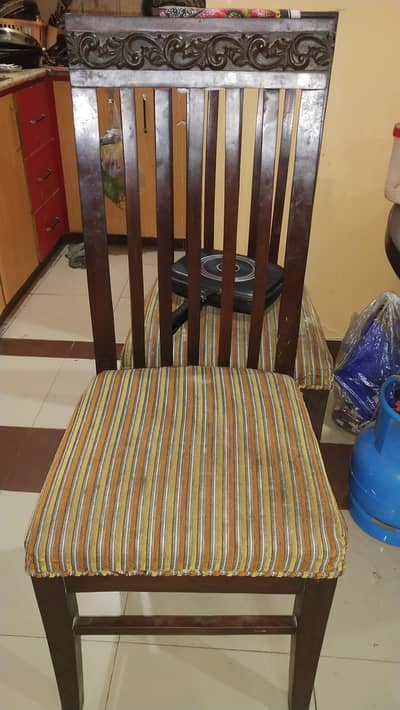 used dining table  with 4 chairs with foam