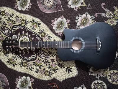Beginner Aucostic Guitar and guitar bag with beginner friendly action